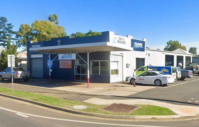 Daly and Richards Garage workshop gallery image